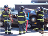 Firefighters and Crashed Cars