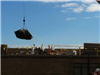 Crane removing roof