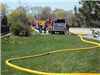 Fire hoses on grass