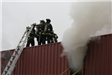 Firefighters on roof