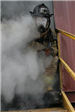 Firefighter surrounded by smoke