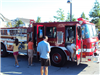 People Standing in Front of Fire Truck