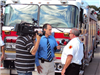 News Man Speaking With Firefighter