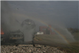 Rainbow in fire hose spray