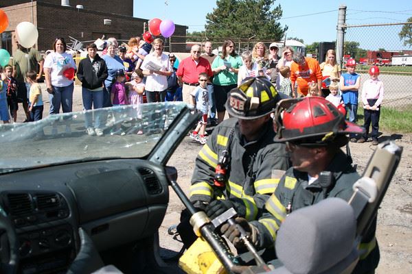 Fire Fighters Teaching a Crowd